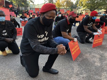 Julius Malema, leader of South Africa's opposition party the Economic Freedom Fighters (EFF), kneels during a protest against the death in Minneapolis police custody of George Floyd and Collins Khoza, who died after a confrontation with South African security forces enforcing the nationwide coronavirus disease (COVID-19) lockdown, outside the U.S embassy in Pretoria, South Africa June 8, 2020.