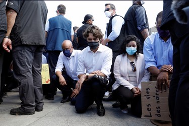 Canada's Prime Minister Justin Trudeau wears a mask as he takes part in a rally against the death in Minneapolis police custody of George Floyd, on Parliament Hill, in Ottawa, Ontario, Canada June 5, 2020. REUTERS/Blair Gable ORG XMIT: GGGOTW105