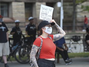 Hundreds of people showed up to a rally held at Nathan Phillips Square -put together by a group called "No Pride in Policing Coalition" -asking to abolish, defund, disarm police forces in Toronto and across Canada on Sunday, June 28, 2020.
