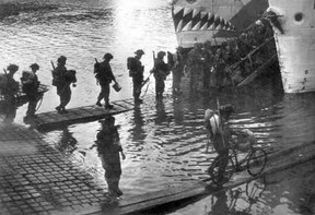 Canadian troops from the North Nova Scotia Highlanders and Highland Light Infantry of Canada board ships at Portsmouth, England. Canada’s North Nova Scotia Highlanders, backed by the tanks of the Sherbrooke Fusiliers, were fighting some eight kilometres northwest of Caen, near a town called Authie, when they first encountered the 12th SS Panzer Division. FILE PHOTO