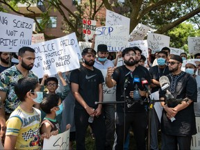 Hashim Choudhary addresses the media in front of the apartment building where his uncle, Ejaz Choudry, a 62-year-old man who family members said was experiencing a schizophrenic episode, was shot by Peel Police and died at the scene the previous night, in Mississauga, Ont., Sunday, June 21, 2020.