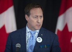 Peter MacKay addresses the crowd during a federal Conservative leadership forum in Halifax on Saturday, Feb. 8, 2020. Even though MacKay threw the party wide open to all persuasions during last week's French-language debate, it is literally 50/50 in caucus support, writes columnist Mark Bonokoski.
