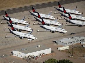 Decommissioned and suspended Air Canada commercial aircrafts are seen stored in Pinal Airpark on May 16, 2020 in Marana, Ariz.