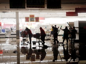 Looters walk through a destroyed K Mart during demonstrations in reaction to the death in Minneapolis police custody of George Floyd in Minneapolis.
Meanwhile, A Michigan woman faces the possibility of residing in crowbar hotel for as long as 10 years for wantonly inciting others to loot and toss bricks at buildings in a Facebook Live video, according to a report.

Alexandria “Ally” Lyons posted the video amid riots in Grand Rapids that left in excess of 100 businesses damaged, MLive.com reported.