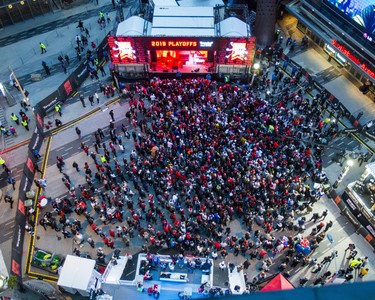 Fans get ready to watch the Toronto Raptors take on the Golden State Warriors during Game 6 NBA Finals action screened at Jurassic Park outside of the Scotiabank Arena in Toronto, Ont. on Thursday June 13, 2019.