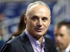 MLB Commissioner Rob Manfred looks on during Gatorade All-Star Workout Day at Marlins Park on July 10, 2017 in Miami.