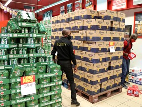 A security guard looks on at a liquor store as South Africa eases a two-month lockdown to try to revive the economy amid the spread of COVID-19, in Soweto, South Africa.
The American Cancer Society is saying now that cutting out alcohol completely is the best way to go, announcing the change on Tuesday in its guidelines on cancer reduction and prevention.