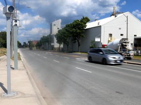 A red light camera at Kipling and Horner Ave. in Toronto on Friday, June 26, 2020. Starting Monday, July 6, plate owners caught speeding by one of Toronto's 50 new speed enforcement cameras will start getting real tickets for their infractions. DAVE ABEL/TORONTO SUN