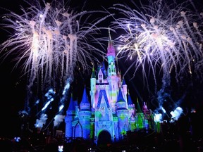 Cinderella's castle at Walt Disney World in Orlando, Fla., is surrounded by fireworks.