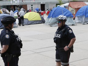 Tents are set up in front of Toronto City Hall in Nathan Phillips Square on Thursday, June 25, 2020.