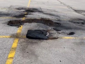 Burn rubber and tire debris litter a GTA parking lot after a rash of stunt driving incidents Friday evening