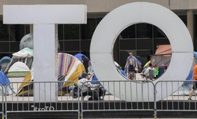 Tents are set up in front of Toronto City Hall in Nathan Phillips Square on Thursday, June 25, 2020. CRAIG ROBERTSON/TORONTO SUN