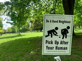 Signs asking visitors to Trinity Bellwoods Park to "be a good neighbour" and "pick up after your human" recently surfaced in the park after massive crowds gathered two weekends ago. Neighbours reported public urination on their properties because the park washrooms remained closed.