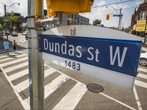 A street sign for Dundas St. W. in Toronto, Ont. on Wednesday June 10, 2020.
