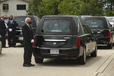 The hearses arrive at the front of St. Eugene De Mazenod Catholic Church in Brampton arrive for the funerals for Karolina Ciasullo and her three daughters Klara, Mila and Lilianna who were killed last Thursday arrive at the church  . Jack Boland/Toronto Sun/Postmedia Network