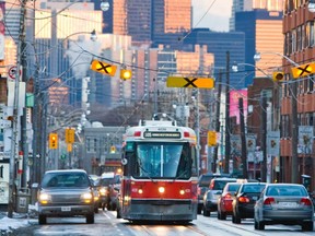 An eastbound TTC streetcar makes its way along Dundas Street West in Toronto.