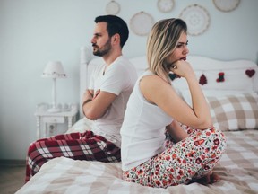 Couple having arguments and sexual problems in bed