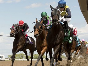 The Woodbine thoroughbred season was originally scheduled to begin on April 18, but was suspended because of the COVID 19 pandemic. Saturday marked the opening day for the 2020 season — without spectators in the grandstand.  Michael Burns photo