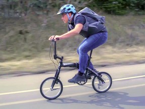 Revelo CEO Henry Chong  putting a 16 inch wheel Lift bike through its paces.