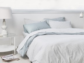 White, soft grey and blue help to chill down a warm, summer bedroom with cool colours and breathable bedding. Crisp Chambray Duvet Set, $238, Envello.com