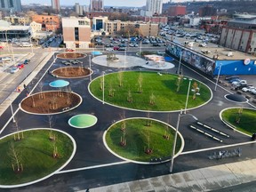 Emblematic of Hamilton's people first approach to urban renewal is the John Rebecca Park - a former 170-spot car park that is now a mix of green space, benches, tables and walkways. PHOTO BY JASON THORNE.