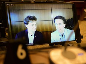 Marc Kielburger, left, and Craig Kielburger appear as witnesses via video conference during a House of Commons finance committee in the Wellington Building in Ottawa on Tuesday, July 28, 2020.