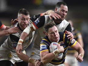 Richie Myler of Leeds Rhinos is tackled by the Toronto Wolfpack defence during the Betfred Super League match between Leeds Rhinos and Toronto Wolfpack at Emerald Headingley Stadium on March 05, 2020 in Leeds, England.