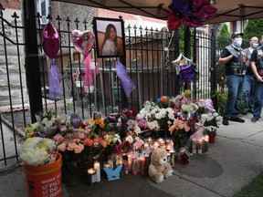 Candles burn in front of a memorial for for 10-year-old Lena Nunez who was killed recently by a stray bullet in Chicago.
Gun violence has picked up recently in Chicago and other U.S. cities.