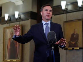 Minister of Finance Bill Morneau answers a question during a television interview about the Economic and Fiscal Snapshot on Parliament Hill in Ottawa, July 8, 2020.