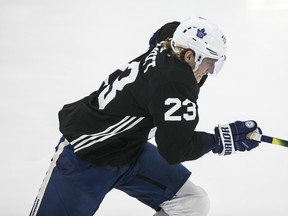 Defenceman Travis Dermott digs in during skating drills at the Maple Leafs  camp in Toronto on Tuesday July 14, 2020.