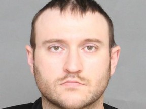 Mark William Kubicz, 32, of Thornhill, is accused by Toronto Police of choking and beating a 65-year-old woman on July 23, 2020.