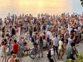 Scores of people held a party on Third Beach in Vancouver despite pleas from health officials to maintain social distancing protocols as the number of COVID-19 cases spike in B.C.