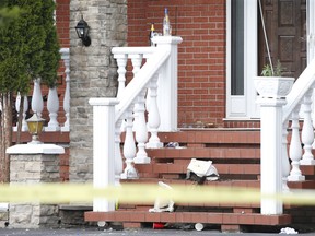 Debris litters the scene of a shooting at a weekend-long house party in Brampton early Monday, July 27, 2020.