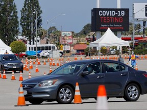 A drive-through testing centre is shown in operation during an outbreak of the coronavirus disease in Inglewood, California, July 20, 2020.