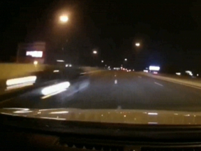 A car is seen travelling the wrong way on the Gardiner and coming towards a vehicle that recorded the incident using a dashcam on Saturday, July 18, 2020.