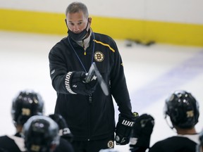 Boston Bruins head coach Bruce Cassidy gives instructions to his players at training camp last week.