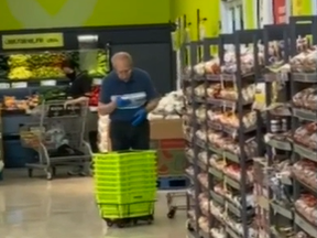 A cleaner seen spitting on a towel before wiping down grocery baskets at a Toronto FreshCo is no longer working at the store after a customer recorded the incident on video.