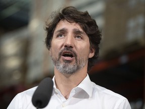 Prime Minister Justin Trudeau delivers a statement about the situation in Hong Kong at the start of a news conference in Gatineau, Que., Friday, July 3, 2020.