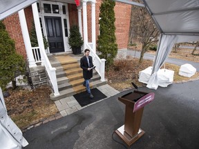 Prime Minister Justin Trudeau arrives for his daily press conference on the COVID-19 pandemic outside of his residence at Rideau Cottage in Ottawa.