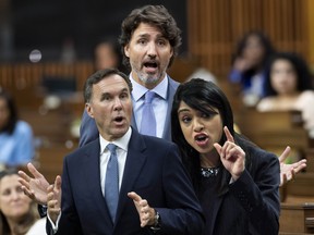 Prime Minister Justin Trudeau rises during a sitting of the Special Committee on the COVID-19 Pandemic in the House of Commons Wednesday July 22, 2020 in Ottawa. THE CANADIAN PRESS/Adrian Wyld