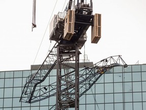A crane collapse at Simcoe St. and Front St. W. in Toronto on Thursday, July 16, 2020. on Thursday July 16, 2020.