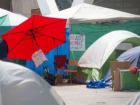 Tents occupying Nathan Phillips Square in Toronto on Tuesday, July 7.