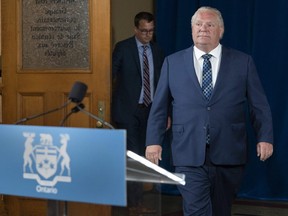 Ontario Premier Doug Ford arrives for the daily briefing at Queen’s Park in Toronto on Friday, July 3, 2020.