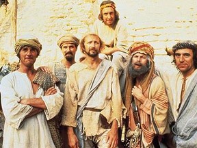 The Monty Python troupe in a scene from Life Of Brian, a satirical look at the crucifixion of Jesus.