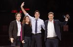 Canada's Prime Minister Justin Trudeau and his wife Sophie Gregoire-Trudeau are flanked by We Day co-founders Craig Kielburger, left, and Marc Kielburger, right. MATT DAY/OTTAWA SUN