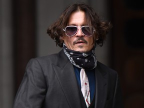 Johnny Depp arrives at The Royal Courts of Justice, Strand on July 8, 2020 in London, England. The Hollywood actor is taking News Group Newspapers, publishers of The Sun, to court over allegations that he was violent towards his ex-wife, Amber Heard, 34.