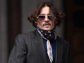 Johnny Depp arrives at The Royal Courts of Justice, Strand on July 8, 2020 in London, England.