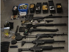Toronto Police have laid 53 charges after executing two warrants on July 14, leading to the recovery of 11 guns, 11,000 rounds of ammunition, 110 grams of crack cocaine, 400 grams of heroin and 672 grams of crystal meth.
