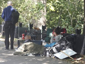 The homeless population inundates the area around Toronto city hall.