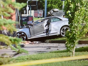 Three people are dead after a car crashed into the wall of a business on Calgary Trail early Friday morning in Edmonton, and police are still looking for the driver. July 3, 2020 Shaughn Butts/Postmedia